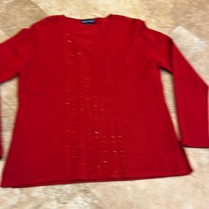 Woman’s red sweater